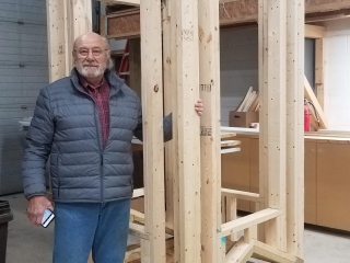 Steve Stier next to walls of    the cupola